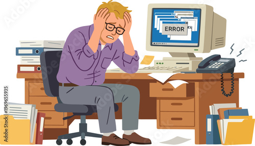 Man stressed sitting at office desk with computer error