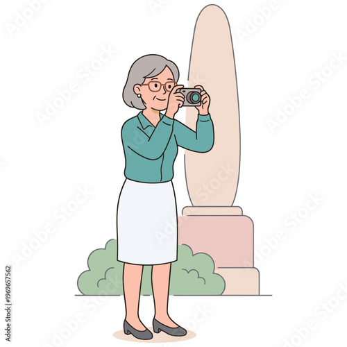 An elderly woman takes a photo of a monument with her camera outdoors.