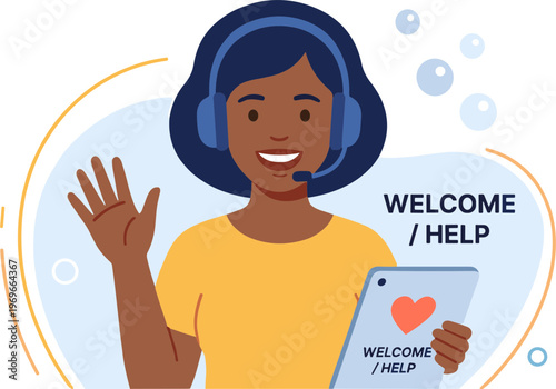 A smiling woman wearing a headset waves at the camera while holding a tablet with a heart on the screen.