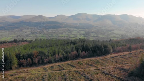 Aerial view of Galty Mountains showcasing ecological balance and sustainable tourism opportunities, highlighting natural beauty and conservation.