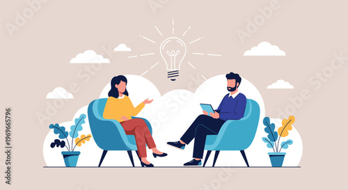 Two professionals sitting in armchairs having a productive conversation with a glowing lightbulb idea symbol between them.