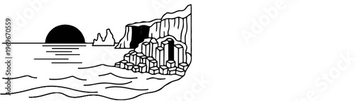 Sun sets over ocean waves near columnar basalt cliffs and cave