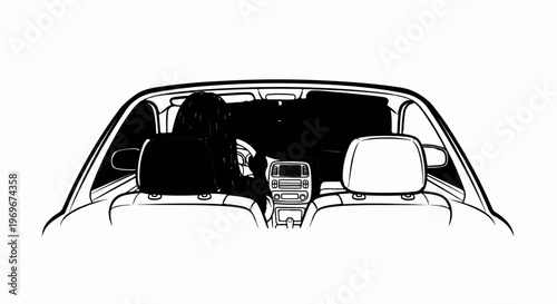 View from the back seat of a car with a driver at the wheel