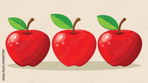 Red apples on a light background with green leaves showing freshness and vitality