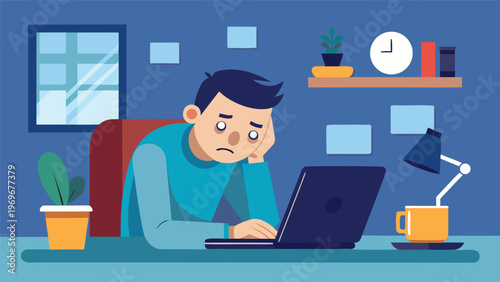 Man sits at desk looking worried while working on laptop in an office setting during the day