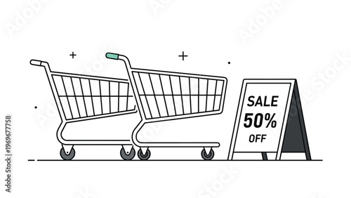 Two empty metal shopping carts stand on a store floor next to a black and white sale sign offering a fifty percent discount on products.