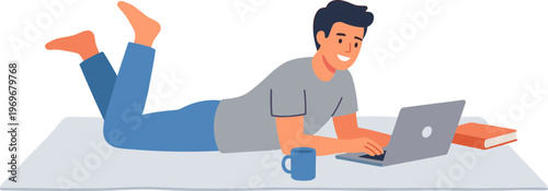 Man reclines on floor working on laptop with book and coffee