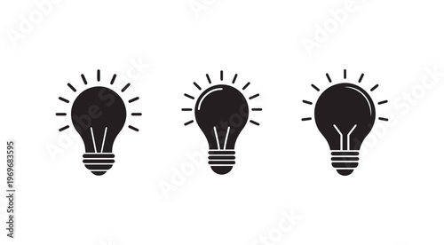 Three black light bulb icons with rays on white background  symbolizing ideas and inspiration