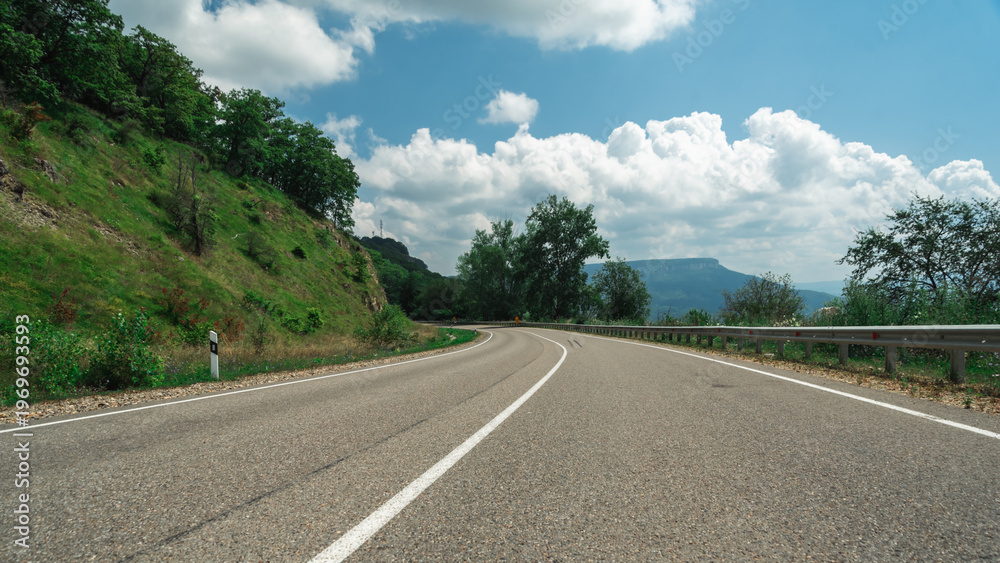 Fototapeta premium empty road in the mountains without people and without cars