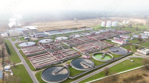 Wastewater Treatment Plant with Multiple Clarifiers and Industrial Buildings