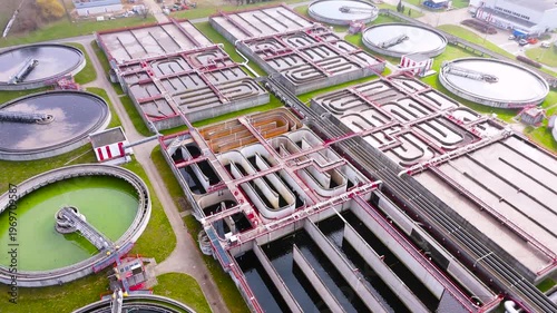 Aerial View of Wastewater Treatment Plant with Filtration Basins and Circular Clarifiers