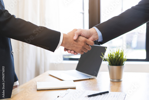 Support, business people, happy asian young man in suit, making handshake, shake hand together with partnership, customer or colleague after is done, successful. Worker meeting, congrats merger.