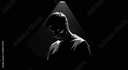 Headlight illuminates a man looking down in a dark, moody setting