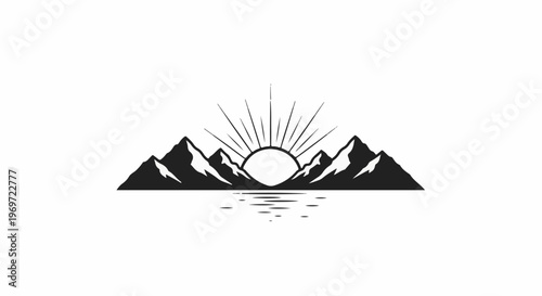 Majestic mountain peaks at sunrise reflected in calm water