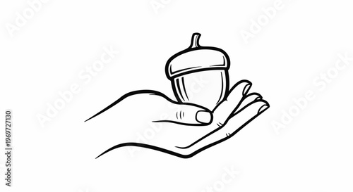 Hand cupped gently holding a single acorn, a symbol of growth and nature