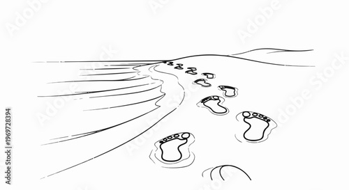 Footprints lead across sandy shore towards the sea