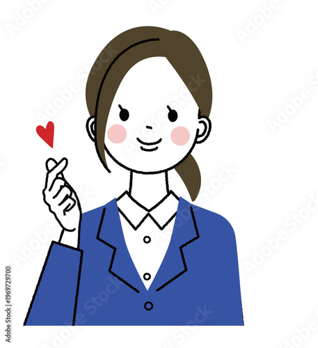 紺色のスーツを着た若い女性　指ハートをしている女性