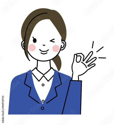 紺色のスーツを着た若い女性　okポーズでウインクしている女性
