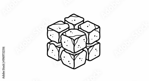 Stacked sugar cubes with dark speckles on white background