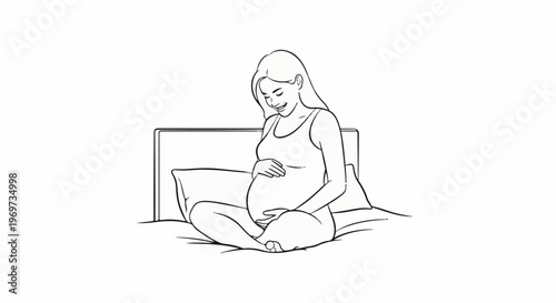 Pregnant woman sitting on bed, smiling and holding her belly