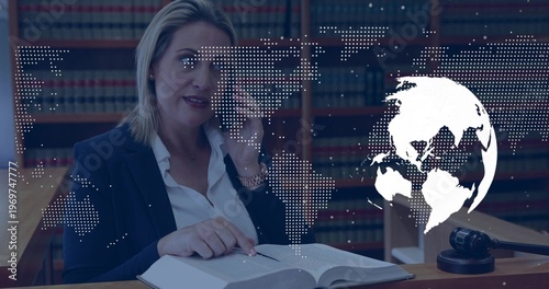 Consulting woman in navy blazer reading book at law library, holding phone, gavel, map overlay