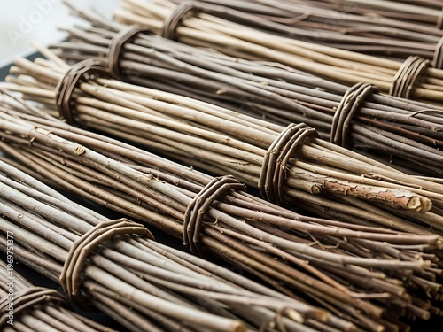 Rustic bundles of natural thin branches tied with pliable twigs closeup