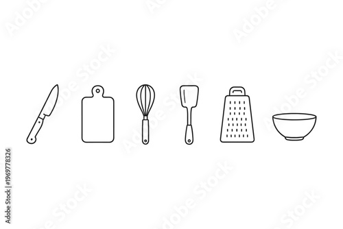 Collection of essential kitchen utensils and tools for cooking and baking