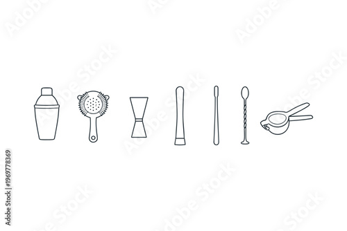 Collection of essential bar tools for cocktail preparation and mixing drinks