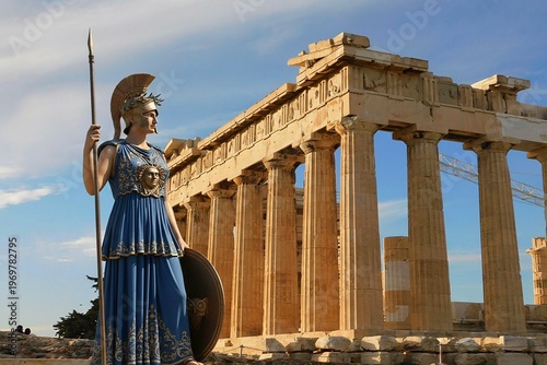 The ancient Greek goddess Athena, next to her temple, the Parthenon on the Acropolis, in Athens, Greece