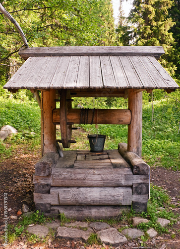 Wooden well is in Russian holy place, Solovetsky Islands, Russia.