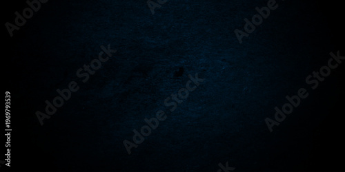 Dark Blue background with grunge backdrop texture, watercolor painted mottled blue background, colorful bright ink and watercolor textures on black paper background.