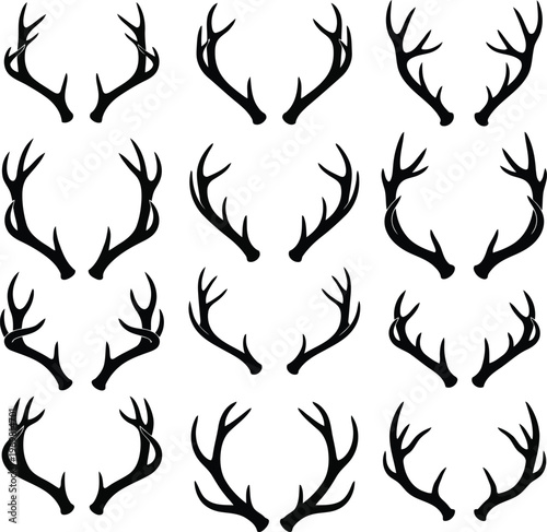Collection of diverse black deer antlers silhouetted against a white background showcasing various sizes and shapes