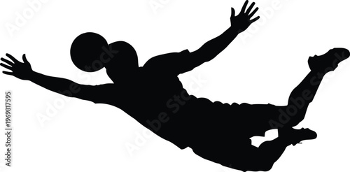 Black silhouette of a soccer player performing a spectacular bicycle kick in midair with the ball