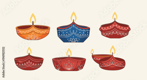 Set of colorful traditional Indian diyas with intricate patterns, lit with a warm flame, on a light background