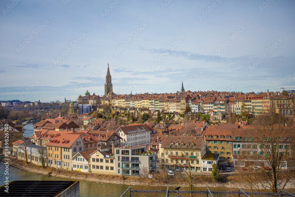 Fototapeta premium Bern, capital city of Switzerland, general perspective of the old city and the Schwarzes Quartier on the banks of the Aare river. 