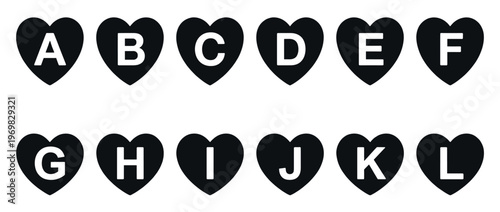 Black heart shapes with white uppercase letters A through L arranged in two rows, representing a decorative alphabet.