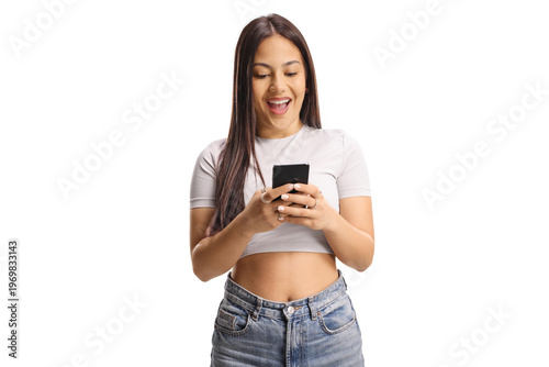 Young woman looking at her smartphone with an excited expression