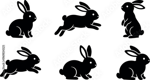 Black silhouette rabbits in various poses vector art