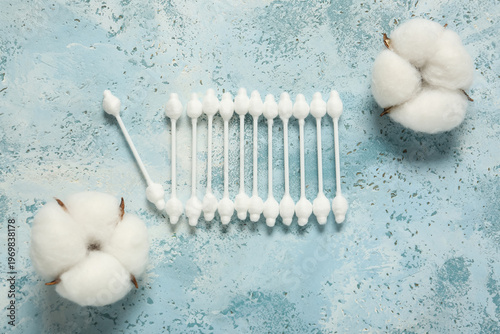 Cotton buds and flowers on ...