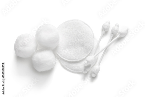 Foto Cotton buds with balls and pads on white background