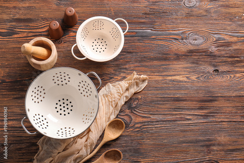 Different colanders with sp...