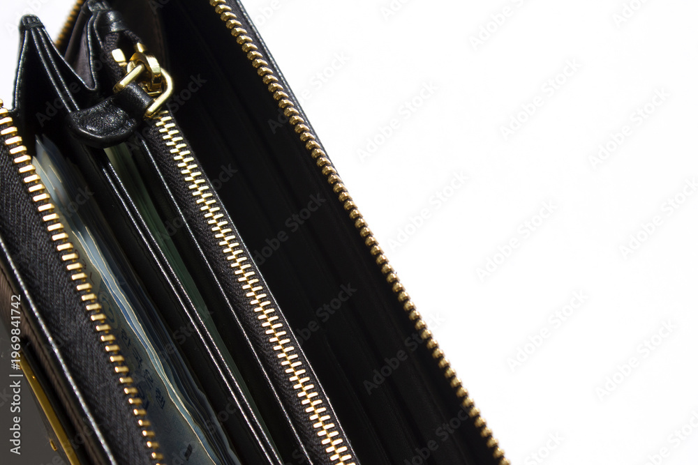 Obraz premium black wallet open over white background