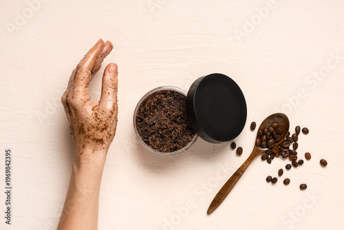 Female hand with jar of cof...