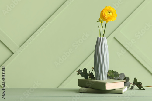 Vase with yellow ranunculus...