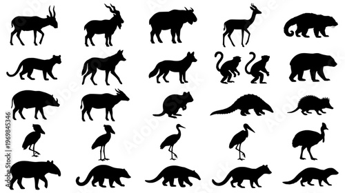Large set of diverse wild animal silhouettes including markhor monkey pangolin shoebill and tapir