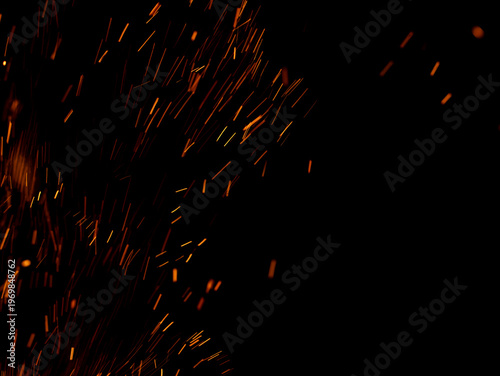 A black background with a lot of orange sparks