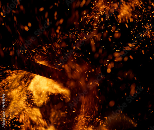 A fire is burning and the smoke is creating a lot of sparks