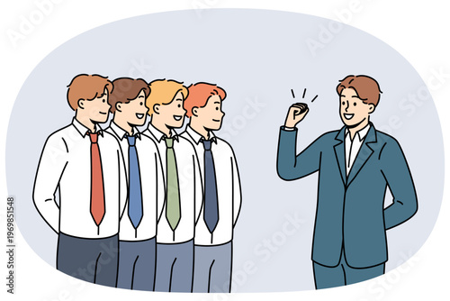 Business man leader gives motivational speech to team of office clerks standing in row. Manager with leadership qualities conducts motivational training for colleagues to increase productivity