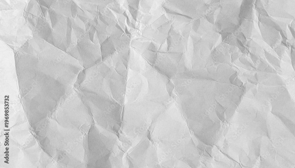 Naklejka premium Old crumpled paper sheet with torn edges and weathered texture. Blank white background ideal effect.