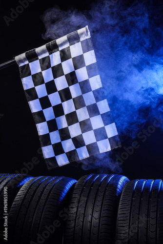 Racing flag with car tires ...